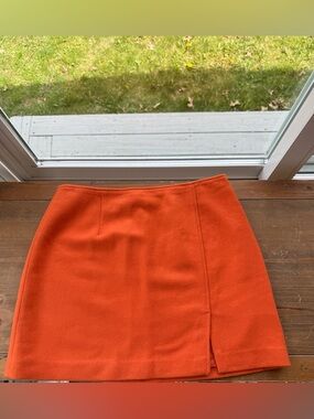 Express orange wool Y2K skirt, front side slit. EUC.